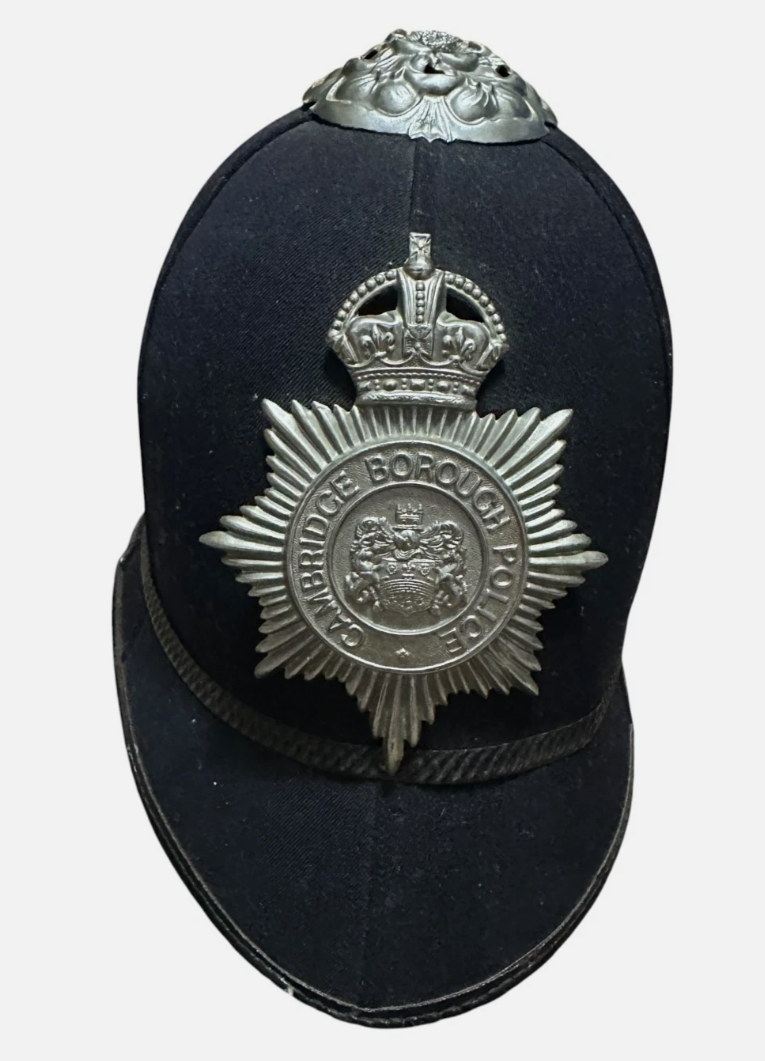 British bobby custodian helmet with Cambridge Borough Police silver badge and crown