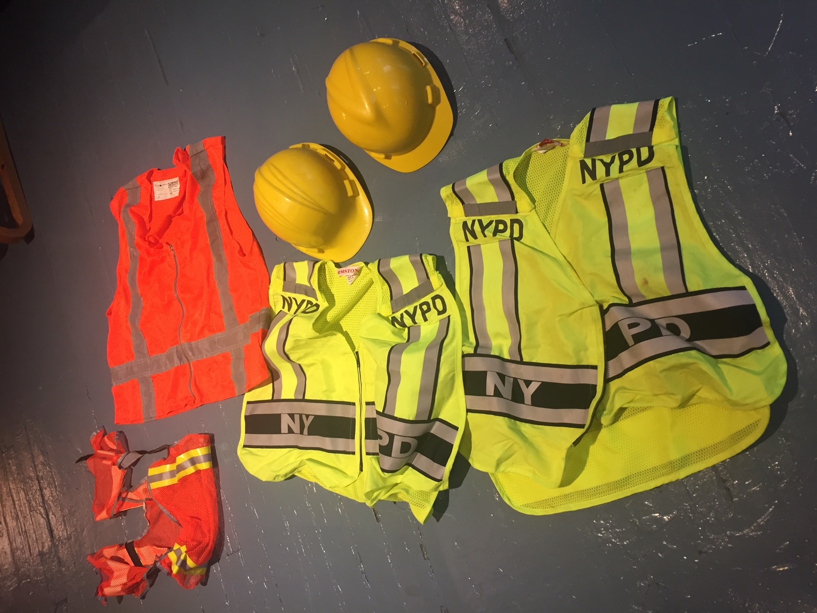Con Ed and NYPD safety vests and hard hats