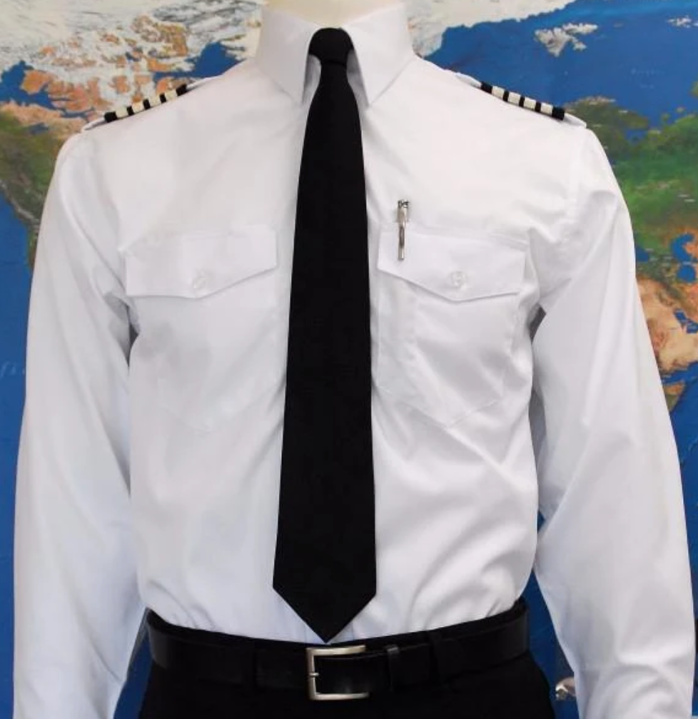 Commercial pilot white epaulette shirt with black tie and trousers