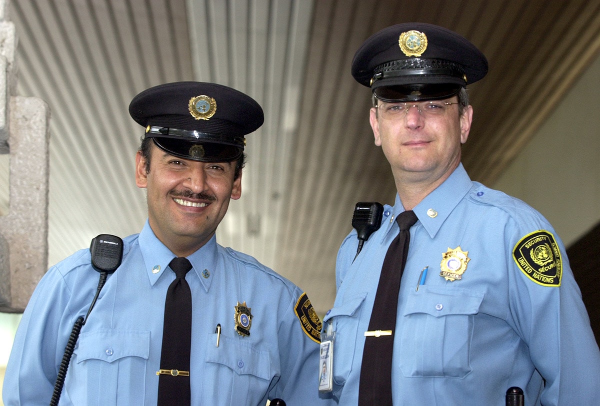 Security guard uniforms light blue shirt dark tie hat with badge and patches