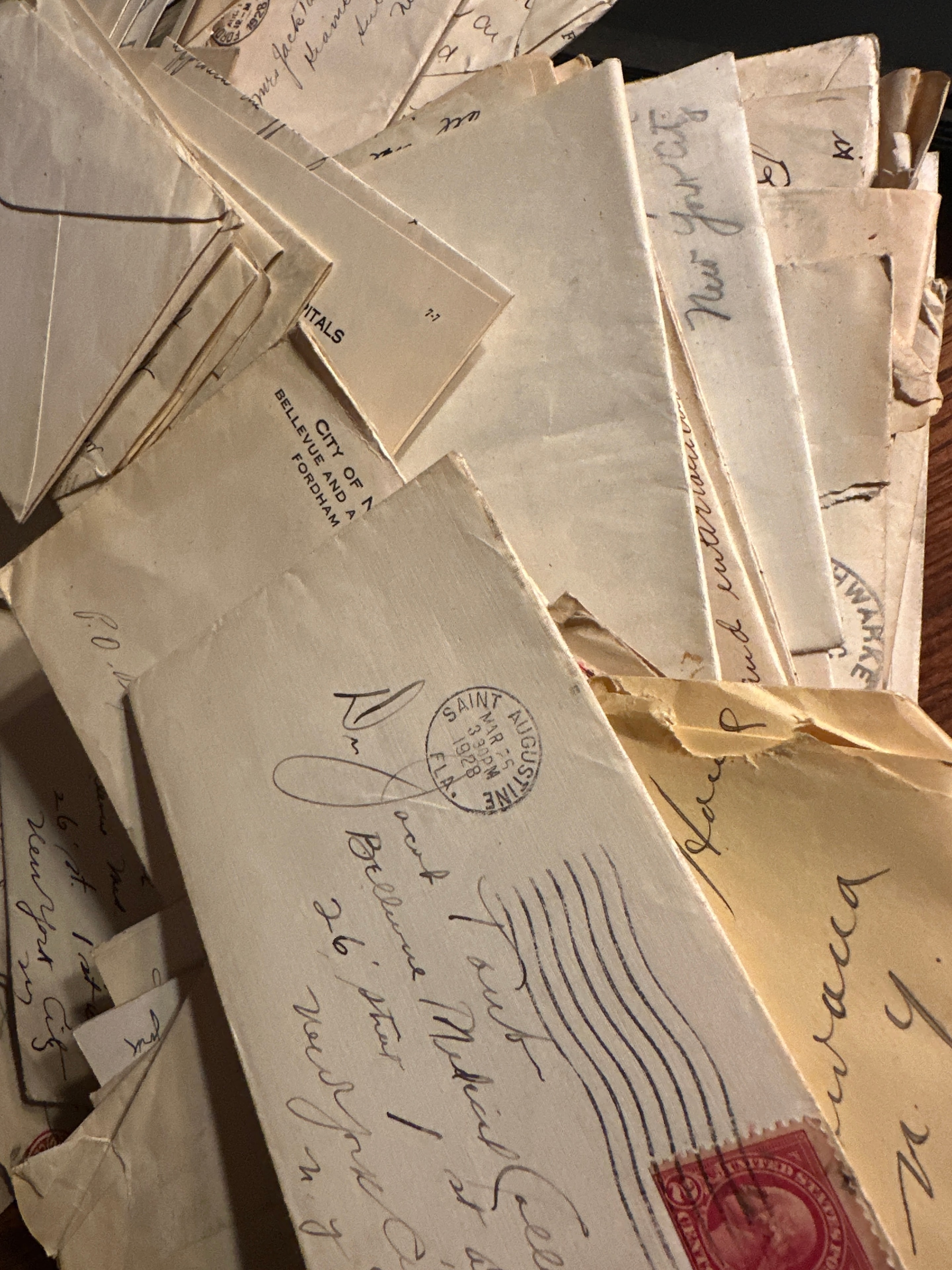 Collection of vintage handwritten letters and envelopes with postmarks and stamps from the 1930s–1950s