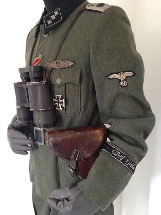 WWII German field uniform fully dressed with binoculars, Iron Cross, eagle insignia and leather holster