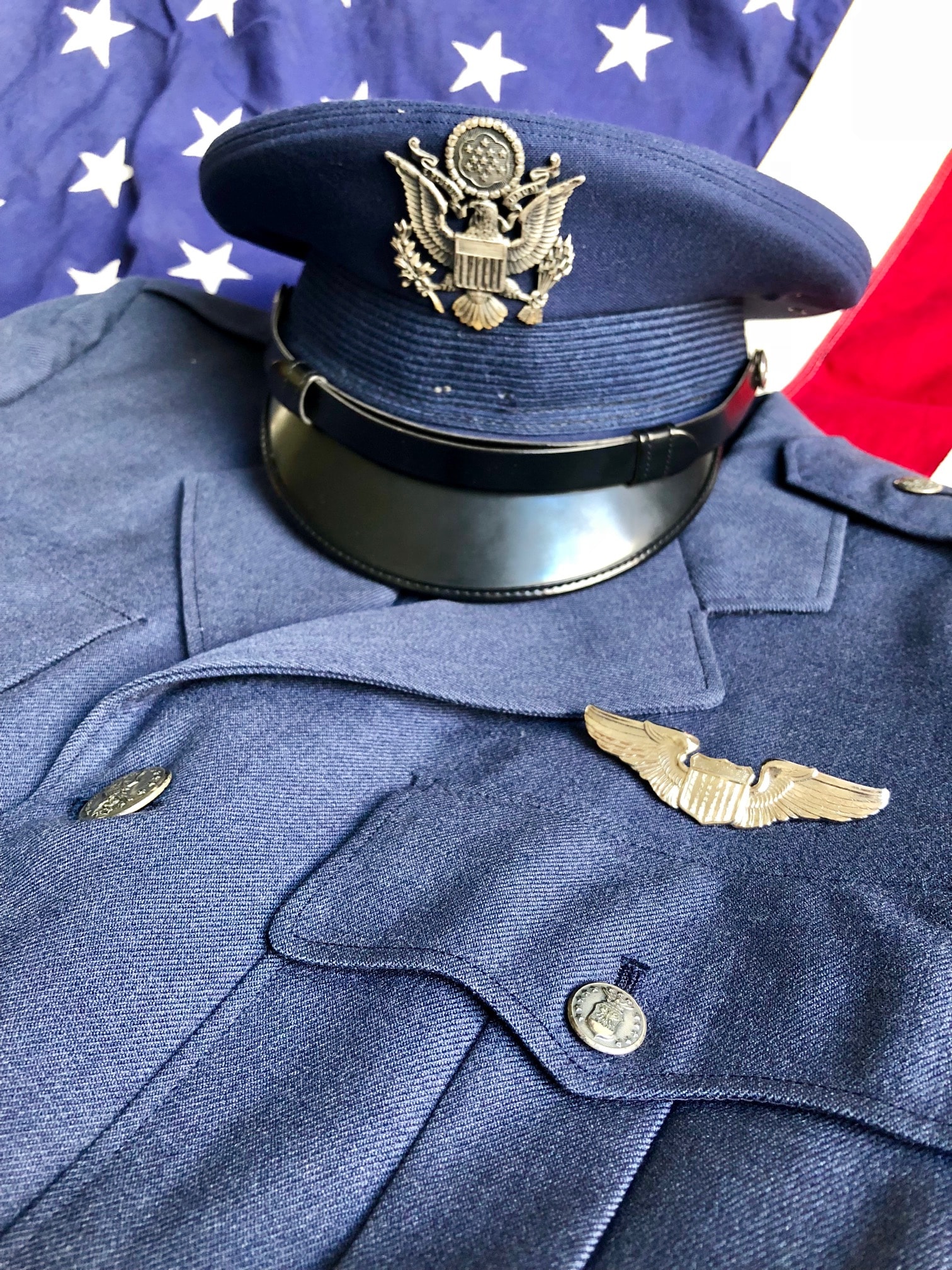 1950s US Air Force dress uniform with officer cap and pilot wings