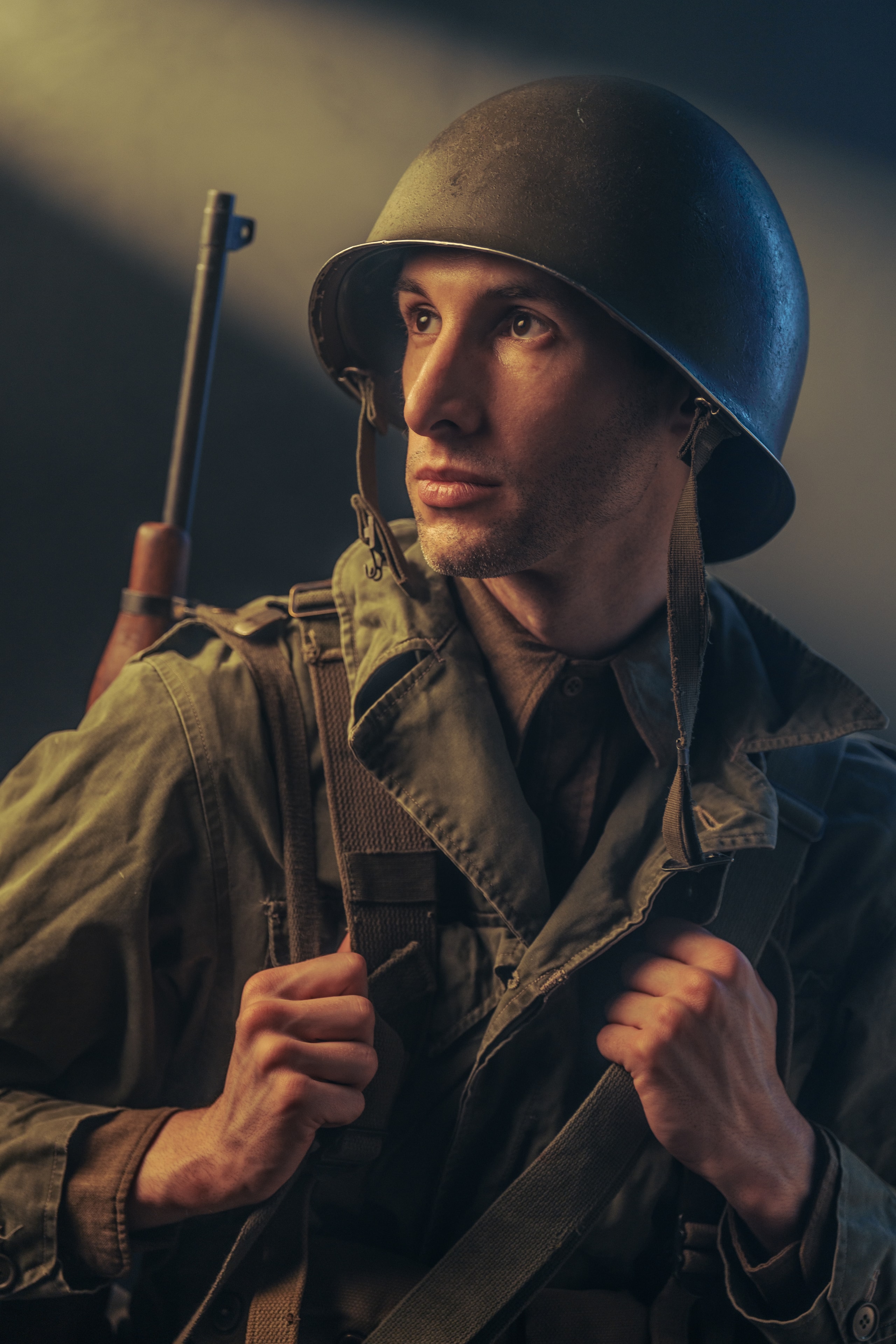 WWII US Army Bazooka Joe infantry soldier — M1 helmet, HBT field jacket, web gear harness, and M1 Garand rifle